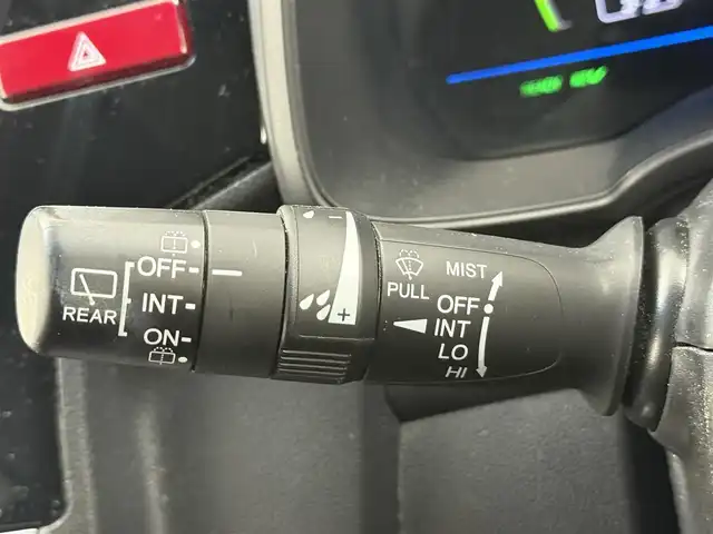 ホンダ フィット ハイブリット Fパッケージ 愛知県 2015(平27)年 9.1万km ティンテッドシルバーM 純正ナビ/（CD/DVD/Bluetooth/ワンセグ）/ETC/バックカメラ/横滑り防止/ステアスイッチ/ECOモード付き/ドアバイザー/電格ミラー/スマートキー/プッシュスタート/ハロゲンヘッドライト/マニュアルレベライザー