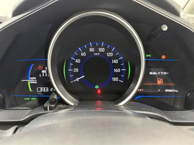 ホンダ フィット ハイブリット Fパッケージ 愛知県 2015(平27)年 9.1万km ティンテッドシルバーM 純正ナビ/（CD/DVD/Bluetooth/ワンセグ）/ETC/バックカメラ/横滑り防止/ステアスイッチ/ECOモード付き/ドアバイザー/電格ミラー/スマートキー/プッシュスタート/ハロゲンヘッドライト/マニュアルレベライザー