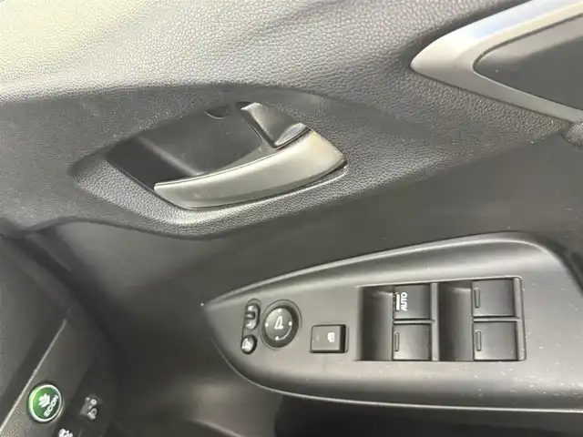 ホンダ フィット ハイブリット Fパッケージ 愛知県 2015(平27)年 9.1万km ティンテッドシルバーM 純正ナビ/（CD/DVD/Bluetooth/ワンセグ）/ETC/バックカメラ/横滑り防止/ステアスイッチ/ECOモード付き/ドアバイザー/電格ミラー/スマートキー/プッシュスタート/ハロゲンヘッドライト/マニュアルレベライザー