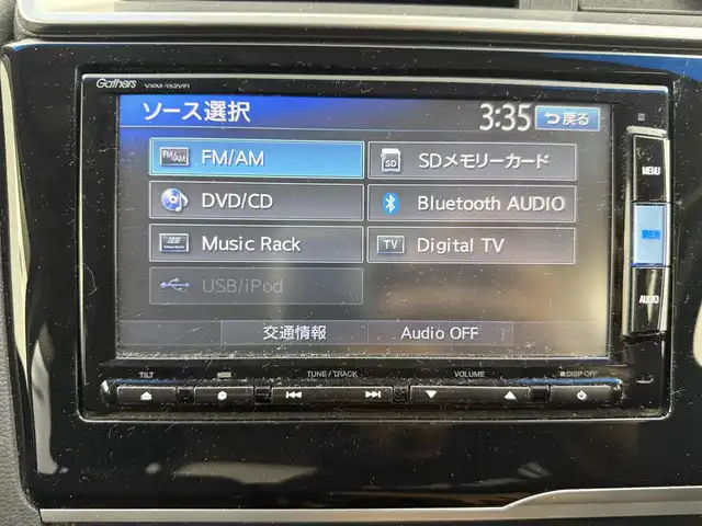 ホンダ フィット ハイブリット Fパッケージ 愛知県 2015(平27)年 9.1万km ティンテッドシルバーM 純正ナビ/（CD/DVD/Bluetooth/ワンセグ）/ETC/バックカメラ/横滑り防止/ステアスイッチ/ECOモード付き/ドアバイザー/電格ミラー/スマートキー/プッシュスタート/ハロゲンヘッドライト/マニュアルレベライザー