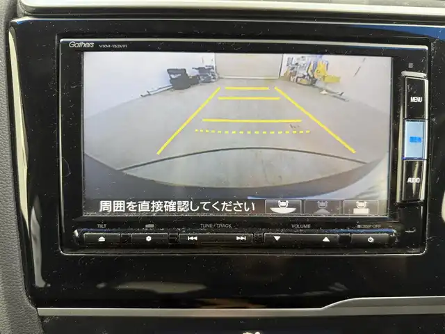 ホンダ フィット ハイブリット Fパッケージ 愛知県 2015(平27)年 9.1万km ティンテッドシルバーM 純正ナビ/（CD/DVD/Bluetooth/ワンセグ）/ETC/バックカメラ/横滑り防止/ステアスイッチ/ECOモード付き/ドアバイザー/電格ミラー/スマートキー/プッシュスタート/ハロゲンヘッドライト/マニュアルレベライザー