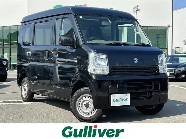 スズキ エブリイ PC リミテッド 愛媛県 2019(令1)年 7.4万km ブルーイッシュブラックパール3 登録時走行距離:73520km/ディーラーOP純正ナビ/AM/FM/TV/DVD/CD/SD/Bluetooth/ETC/ＡＣ/ハロゲンヘッドライト/両側スライドドア/横滑り防止装置/盗難防止装置/衝突軽減システム/ABS/パワステ/エアバッグ/リモコンキー/スペアキー