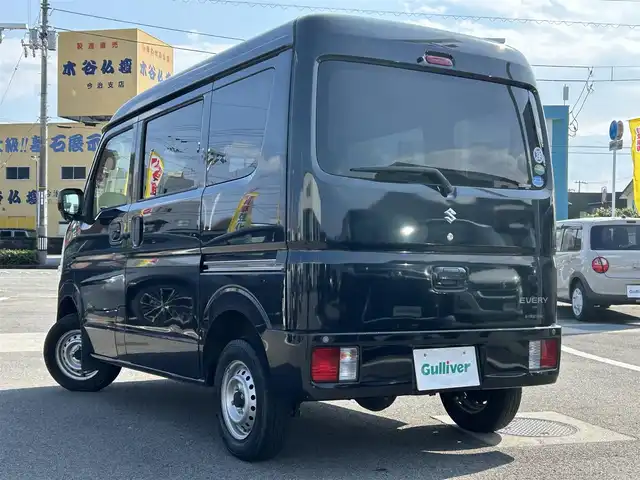 スズキ エブリイ PC リミテッド 愛媛県 2019(令1)年 7.4万km ブルーイッシュブラックパール3 登録時走行距離:73520km/ディーラーOP純正ナビ/AM/FM/TV/DVD/CD/SD/Bluetooth/ETC/ＡＣ/ハロゲンヘッドライト/両側スライドドア/横滑り防止装置/盗難防止装置/衝突軽減システム/ABS/パワステ/エアバッグ/リモコンキー/スペアキー