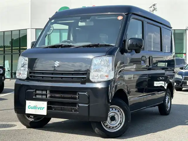 スズキ エブリイ PC リミテッド 愛媛県 2019(令1)年 7.4万km ブルーイッシュブラックパール3 登録時走行距離:73520km/ディーラーOP純正ナビ/AM/FM/TV/DVD/CD/SD/Bluetooth/ETC/ＡＣ/ハロゲンヘッドライト/両側スライドドア/横滑り防止装置/盗難防止装置/衝突軽減システム/ABS/パワステ/エアバッグ/リモコンキー/スペアキー