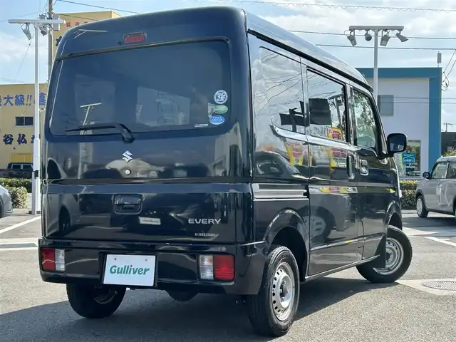 スズキ エブリイ PC リミテッド 愛媛県 2019(令1)年 7.4万km ブルーイッシュブラックパール3 登録時走行距離:73520km/ディーラーOP純正ナビ/AM/FM/TV/DVD/CD/SD/Bluetooth/ETC/ＡＣ/ハロゲンヘッドライト/両側スライドドア/横滑り防止装置/盗難防止装置/衝突軽減システム/ABS/パワステ/エアバッグ/リモコンキー/スペアキー
