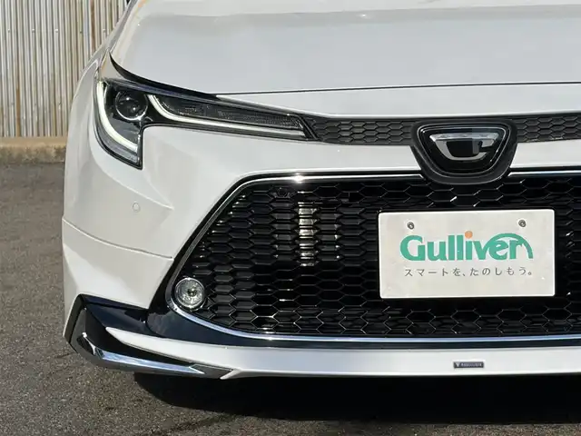 トヨタ カローラツーリング ダブルバイビー 三重県 2021(令3)年 4.6万km プラチナホワイトパールマイカ モデリスタ/　・フロント/　・サイド/　・リアアンダー/トヨタセーフティセンス/　・プリクラッシュセーフティ/　・レーントレーシングアシスト/　・ブラインドスポットモニター/　・クリアランスソナー/　・レーダークルーズコントロール/　・リアクロストラフィックアラート/　・パーキングサポートブレーキ/　・ロードサインアシスト/　・オートハイビーム/純正ナビ/　・AppleCarPlay/　・AndroidAuto/　・Bluetooth/　・フルセグTV/　・ミラキャスト/　・DVD/CD再生/　・USB/純正デジタルインナーミラー/バックガイドカメラ/スポーツモード/プッシュスタート/ハーフレザーシート/D/N席シートヒーター/革巻きステアリング/ステアリングヒーター/ステアリングスイッチ/LEDヘッドライト/LEDフォグライト/オートライト/オートリトラクタブルミラー/ウィンカーミラー/ビルトインETC2.0/ドライブレコーダー前後/後部座席充電用USBポートx２/スペアタイヤ/プライバシーガラス/ドアバイザー/ルーフアンテナ/純正フロアマット/横滑り防止機能/サイド/カーテン/ニーエアバック