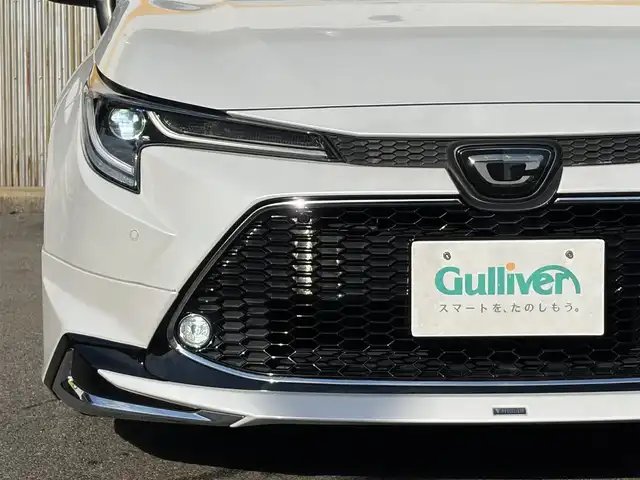 トヨタ カローラツーリング ダブルバイビー 三重県 2021(令3)年 4.6万km プラチナホワイトパールマイカ モデリスタ/　・フロント/　・サイド/　・リアアンダー/トヨタセーフティセンス/　・プリクラッシュセーフティ/　・レーントレーシングアシスト/　・ブラインドスポットモニター/　・クリアランスソナー/　・レーダークルーズコントロール/　・リアクロストラフィックアラート/　・パーキングサポートブレーキ/　・ロードサインアシスト/　・オートハイビーム/純正ナビ/　・AppleCarPlay/　・AndroidAuto/　・Bluetooth/　・フルセグTV/　・ミラキャスト/　・DVD/CD再生/　・USB/純正デジタルインナーミラー/バックガイドカメラ/スポーツモード/プッシュスタート/ハーフレザーシート/D/N席シートヒーター/革巻きステアリング/ステアリングヒーター/ステアリングスイッチ/LEDヘッドライト/LEDフォグライト/オートライト/オートリトラクタブルミラー/ウィンカーミラー/ビルトインETC2.0/ドライブレコーダー前後/後部座席充電用USBポートx２/スペアタイヤ/プライバシーガラス/ドアバイザー/ルーフアンテナ/純正フロアマット/横滑り防止機能/サイド/カーテン/ニーエアバック