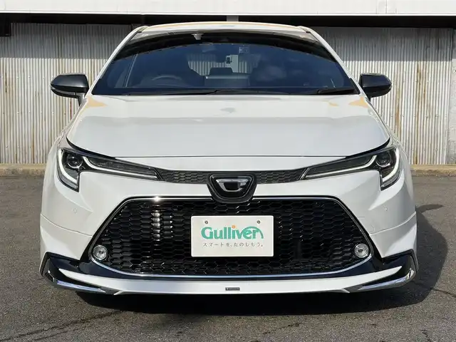 トヨタ カローラツーリング ダブルバイビー 三重県 2021(令3)年 4.6万km プラチナホワイトパールマイカ モデリスタ/　・フロント/　・サイド/　・リアアンダー/トヨタセーフティセンス/　・プリクラッシュセーフティ/　・レーントレーシングアシスト/　・ブラインドスポットモニター/　・クリアランスソナー/　・レーダークルーズコントロール/　・リアクロストラフィックアラート/　・パーキングサポートブレーキ/　・ロードサインアシスト/　・オートハイビーム/純正ナビ/　・AppleCarPlay/　・AndroidAuto/　・Bluetooth/　・フルセグTV/　・ミラキャスト/　・DVD/CD再生/　・USB/純正デジタルインナーミラー/バックガイドカメラ/スポーツモード/プッシュスタート/ハーフレザーシート/D/N席シートヒーター/革巻きステアリング/ステアリングヒーター/ステアリングスイッチ/LEDヘッドライト/LEDフォグライト/オートライト/オートリトラクタブルミラー/ウィンカーミラー/ビルトインETC2.0/ドライブレコーダー前後/後部座席充電用USBポートx２/スペアタイヤ/プライバシーガラス/ドアバイザー/ルーフアンテナ/純正フロアマット/横滑り防止機能/サイド/カーテン/ニーエアバック