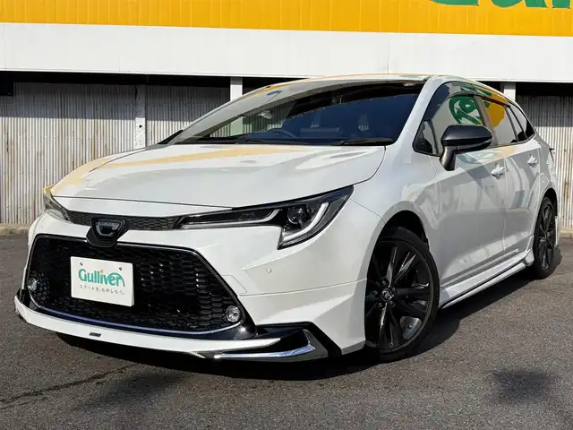 トヨタ カローラツーリング ダブルバイビー 三重県 2021(令3)年 4.6万km プラチナホワイトパールマイカ モデリスタ/　・フロント/　・サイド/　・リアアンダー/トヨタセーフティセンス/　・プリクラッシュセーフティ/　・レーントレーシングアシスト/　・ブラインドスポットモニター/　・クリアランスソナー/　・レーダークルーズコントロール/　・リアクロストラフィックアラート/　・パーキングサポートブレーキ/　・ロードサインアシスト/　・オートハイビーム/純正ナビ/　・AppleCarPlay/　・AndroidAuto/　・Bluetooth/　・フルセグTV/　・ミラキャスト/　・DVD/CD再生/　・USB/純正デジタルインナーミラー/バックガイドカメラ/スポーツモード/プッシュスタート/ハーフレザーシート/D/N席シートヒーター/革巻きステアリング/ステアリングヒーター/ステアリングスイッチ/LEDヘッドライト/LEDフォグライト/オートライト/オートリトラクタブルミラー/ウィンカーミラー/ビルトインETC2.0/ドライブレコーダー前後/後部座席充電用USBポートx２/スペアタイヤ/プライバシーガラス/ドアバイザー/ルーフアンテナ/純正フロアマット/横滑り防止機能/サイド/カーテン/ニーエアバック