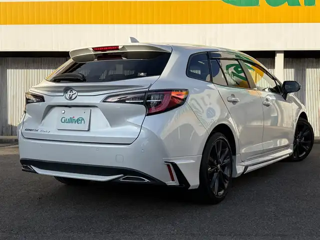 トヨタ カローラツーリング ダブルバイビー 三重県 2021(令3)年 4.6万km プラチナホワイトパールマイカ モデリスタ/　・フロント/　・サイド/　・リアアンダー/トヨタセーフティセンス/　・プリクラッシュセーフティ/　・レーントレーシングアシスト/　・ブラインドスポットモニター/　・クリアランスソナー/　・レーダークルーズコントロール/　・リアクロストラフィックアラート/　・パーキングサポートブレーキ/　・ロードサインアシスト/　・オートハイビーム/純正ナビ/　・AppleCarPlay/　・AndroidAuto/　・Bluetooth/　・フルセグTV/　・ミラキャスト/　・DVD/CD再生/　・USB/純正デジタルインナーミラー/バックガイドカメラ/スポーツモード/プッシュスタート/ハーフレザーシート/D/N席シートヒーター/革巻きステアリング/ステアリングヒーター/ステアリングスイッチ/LEDヘッドライト/LEDフォグライト/オートライト/オートリトラクタブルミラー/ウィンカーミラー/ビルトインETC2.0/ドライブレコーダー前後/後部座席充電用USBポートx２/スペアタイヤ/プライバシーガラス/ドアバイザー/ルーフアンテナ/純正フロアマット/横滑り防止機能/サイド/カーテン/ニーエアバック