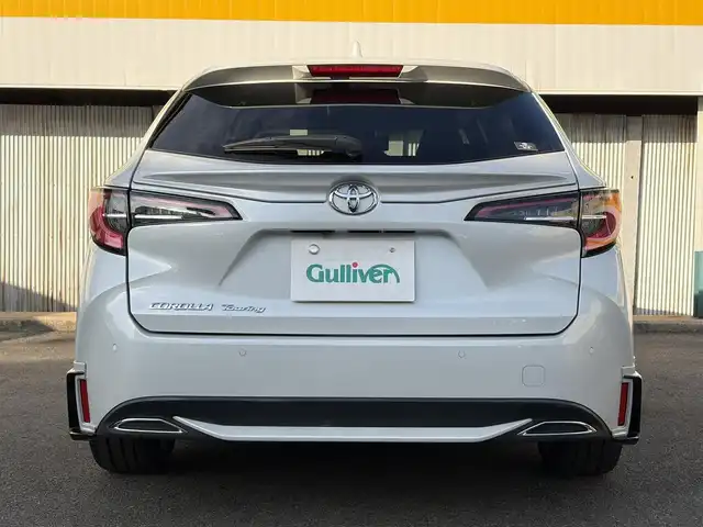 トヨタ カローラツーリング ダブルバイビー 三重県 2021(令3)年 4.6万km プラチナホワイトパールマイカ モデリスタ/　・フロント/　・サイド/　・リアアンダー/トヨタセーフティセンス/　・プリクラッシュセーフティ/　・レーントレーシングアシスト/　・ブラインドスポットモニター/　・クリアランスソナー/　・レーダークルーズコントロール/　・リアクロストラフィックアラート/　・パーキングサポートブレーキ/　・ロードサインアシスト/　・オートハイビーム/純正ナビ/　・AppleCarPlay/　・AndroidAuto/　・Bluetooth/　・フルセグTV/　・ミラキャスト/　・DVD/CD再生/　・USB/純正デジタルインナーミラー/バックガイドカメラ/スポーツモード/プッシュスタート/ハーフレザーシート/D/N席シートヒーター/革巻きステアリング/ステアリングヒーター/ステアリングスイッチ/LEDヘッドライト/LEDフォグライト/オートライト/オートリトラクタブルミラー/ウィンカーミラー/ビルトインETC2.0/ドライブレコーダー前後/後部座席充電用USBポートx２/スペアタイヤ/プライバシーガラス/ドアバイザー/ルーフアンテナ/純正フロアマット/横滑り防止機能/サイド/カーテン/ニーエアバック