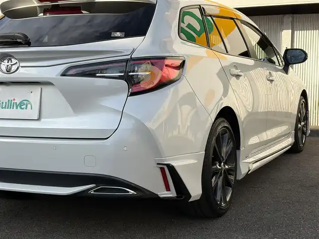 トヨタ カローラツーリング ダブルバイビー 三重県 2021(令3)年 4.6万km プラチナホワイトパールマイカ モデリスタ/　・フロント/　・サイド/　・リアアンダー/トヨタセーフティセンス/　・プリクラッシュセーフティ/　・レーントレーシングアシスト/　・ブラインドスポットモニター/　・クリアランスソナー/　・レーダークルーズコントロール/　・リアクロストラフィックアラート/　・パーキングサポートブレーキ/　・ロードサインアシスト/　・オートハイビーム/純正ナビ/　・AppleCarPlay/　・AndroidAuto/　・Bluetooth/　・フルセグTV/　・ミラキャスト/　・DVD/CD再生/　・USB/純正デジタルインナーミラー/バックガイドカメラ/スポーツモード/プッシュスタート/ハーフレザーシート/D/N席シートヒーター/革巻きステアリング/ステアリングヒーター/ステアリングスイッチ/LEDヘッドライト/LEDフォグライト/オートライト/オートリトラクタブルミラー/ウィンカーミラー/ビルトインETC2.0/ドライブレコーダー前後/後部座席充電用USBポートx２/スペアタイヤ/プライバシーガラス/ドアバイザー/ルーフアンテナ/純正フロアマット/横滑り防止機能/サイド/カーテン/ニーエアバック