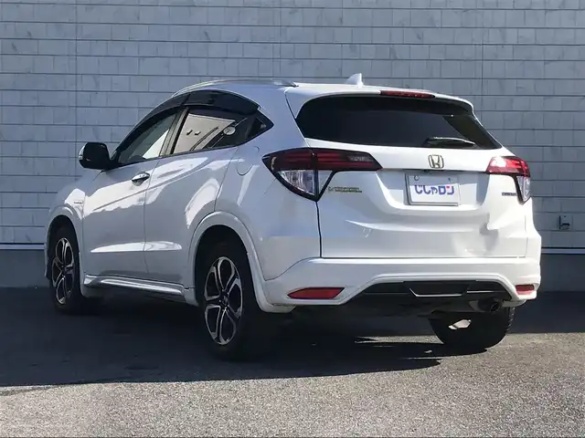 ホンダ ヴェゼル ハイブリッド Z 栃木県 2015(平27)年 9.9万km ホワイトオーキッドパール (株)IDOMが運営する【じしゃロン小山店】の自社ローン対象車両になります。こちらは現金ご利用時の価格です。/自社ローンご希望の方は別途その旨お申付け下さい。//禁煙車/純正フルセグナビ/（CD/DVD/AM/FMラジオ）/(Bluetooth)/スマートキー/プッシュスタート/バックカメラ/ＥＴＣ/クルーズコントロール/シティブレーキアクティブシステム/ルーフレール/シートヒーター/チップアップシート/パドルシフト/ステアリングリモコン/電動格納ドアミラー/パワーウインドウ/オートライト/自動防眩ミラー