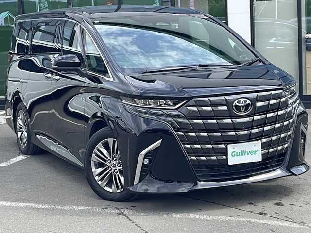 トヨタ アルファードハイブリット Z 道東・釧路十勝 2023(令5)年 2.1万km ブラック 4WD/14インチディスプレイオーディオ/ナビ/ミラキャスト/HDMI/Bluetooth/フルセグ/パノラミックビューモニターシステム/トヨタチームメイト/トヨタセーフティーセンス/・プリクラッシュセーフティー/・レーントレーシングアシスト/・レーダークルーズコントロール/・オートマチックハイビーム/・緊急時操舵支援/・フロントクロストラフィックアラート/・レーンチェンジアシスト/純正フリップダウンモニター/両側パワースライドドア/パワーバックドア/ブラインドスポットモニター/パドルシフト/ステアリングヒーター/ビルトインETC/置くだけ充電
