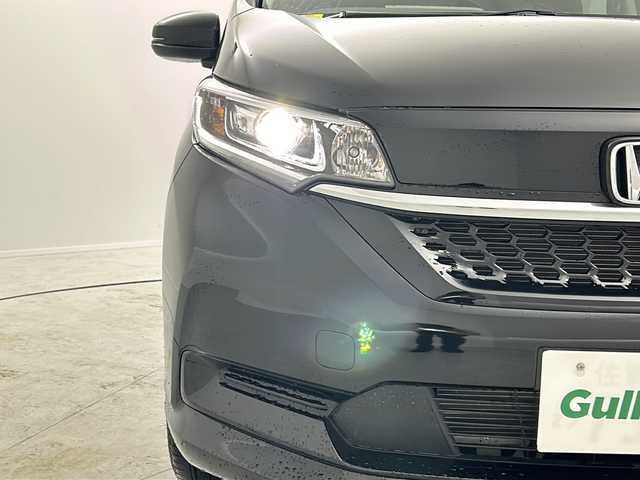 ホンダ フリード ハイブリット G 茨城県 2023(令5)年 1.2万km クリスタルブラックパール 衝突軽減ブレーキ　レーダークルーズコントロール　両側電動スライドドア　社外ナビ　バックカメラ　シートヒーター　ドライブレコーダー　ＬＥＤヘッドライト　オートライト　横滑り防止装置　スマートキー　ＥＴＣ