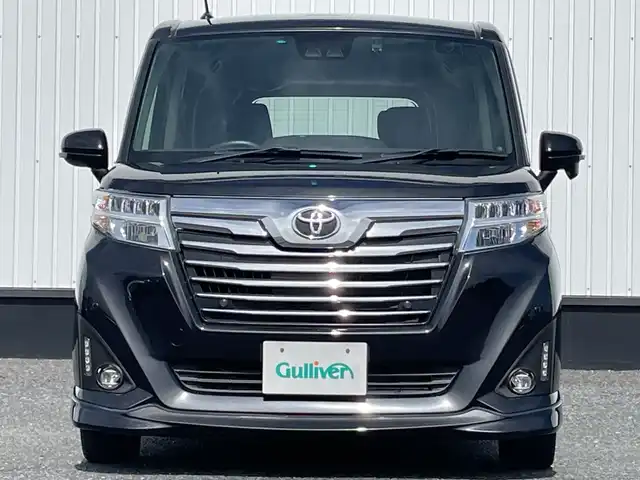 トヨタ ルーミー カスタムG－T 千葉県 2020(令2)年 0.9万km ブラックマイカメタリック 純正9インチSDナビ/(フルセグ/FM/AM/BT/CD/DVD)/バックカメラ/衝突被害軽減システム/クルーズコントロール/両側パワースライドドア/横滑り防止装置/ETC2.0/ドライブレコーダー/アイドリングストップ/LEDヘッドライト/フォグランプ/オートライト/ウィンカーミラー/電動格納ミラー/シートヒーター/エアシート/シートリフター/ステアリングヒーター/プッシュスタート/スマートキー/フロアマット/ドアバイザー/スペアキー/取扱説明書/保証書