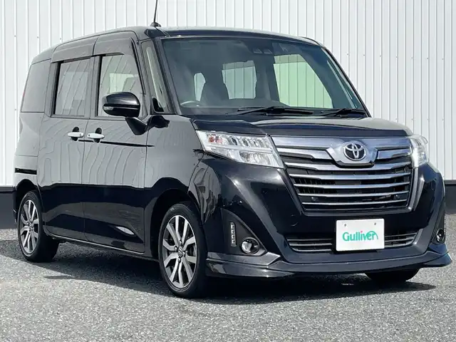 トヨタ ルーミー カスタムG－T 千葉県 2020(令2)年 0.9万km ブラックマイカメタリック 純正9インチSDナビ/(フルセグ/FM/AM/BT/CD/DVD)/バックカメラ/衝突被害軽減システム/クルーズコントロール/両側パワースライドドア/横滑り防止装置/ETC2.0/ドライブレコーダー/アイドリングストップ/LEDヘッドライト/フォグランプ/オートライト/ウィンカーミラー/電動格納ミラー/シートヒーター/エアシート/シートリフター/ステアリングヒーター/プッシュスタート/スマートキー/フロアマット/ドアバイザー/スペアキー/取扱説明書/保証書