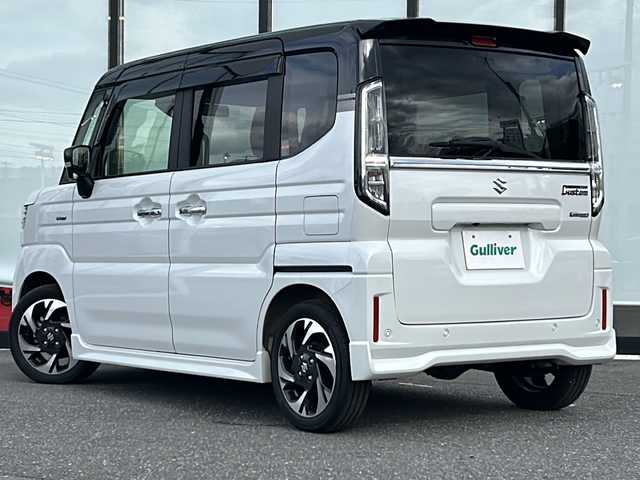 スズキ スペーシア カスタム HYBRID XS ターボ 山形県 2024(令6)年 0.7万km ピュアホワイトパール/ブラック2トーン 禁煙車/ツートンカラー/4WD/デュアルセンサーブレーキサポートII/アダプティブクルーズコントロール/横滑り防止装置/レーンキープアシスト/前後コーナーセンサー/オートマチックハイビーム/全方位カメラ/純正9インチナビ/（Bluetooth/フルセグ/AM/FM/USB)/テレビキャンセラー/ヘッドアップディスプレイ/ステアリングスイッチ/ステアリングヒーター/パドルシフト/ハーフレザーシート/前席シートヒーター/スマートキー×２/純正アルミホイール/LEDライト/フォグランプ