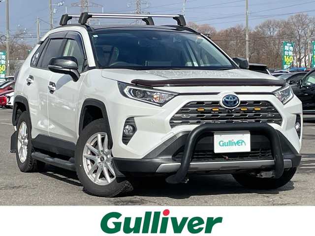 トヨタ ＲＡＶ４ ハイブリットG 道央・札幌 2021(令3)年 3.9万km ホワイトパールクリスタルシャイン ４ＷＤ/ワンオーナー/サンルーフ/純正ナビ/パノラミックビューモニター/ワイパーデアイサー/革巻きステアリング/ステアリングスイッチ/レーダークルーズコントロール/ＬＥＤ/フォグ／リアフォグランプ/オートライト/オートハイビーム/ウィンカーミラー/運転席パワーシート/前席シートヒーター/プリクラッシュセーフティ/レーンキープアシスト/ブラインドスポットモニタリング/リアクロストラフィックアラート/パーキングサポートブレーキ/ロードサインアシスト/コーナーセンサー/横滑り防止装置/バグガード/バンパーガード/社外ステップ/ＴＲＤマフラー/ＴＲＤマッドフラップ/ラダー/ルーフキャリア/プッシュスタート/純正ドアバイザー/ニーエアバッグ/純正エンジンスターター