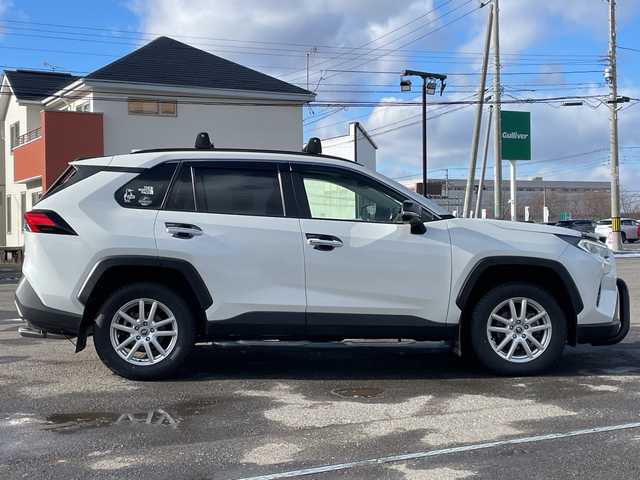トヨタ ＲＡＶ４ ハイブリットG 道央・札幌 2021(令3)年 3.9万km ホワイトパールクリスタルシャイン ４ＷＤ/ワンオーナー/サンルーフ/純正ナビ/パノラミックビューモニター/ワイパーデアイサー/革巻きステアリング/ステアリングスイッチ/レーダークルーズコントロール/ＬＥＤ/フォグ／リアフォグランプ/オートライト/オートハイビーム/ウィンカーミラー/運転席パワーシート/前席シートヒーター/プリクラッシュセーフティ/レーンキープアシスト/ブラインドスポットモニタリング/リアクロストラフィックアラート/パーキングサポートブレーキ/ロードサインアシスト/コーナーセンサー/横滑り防止装置/バグガード/バンパーガード/社外ステップ/ＴＲＤマフラー/ＴＲＤマッドフラップ/ラダー/ルーフキャリア/プッシュスタート/純正ドアバイザー/ニーエアバッグ/純正エンジンスターター