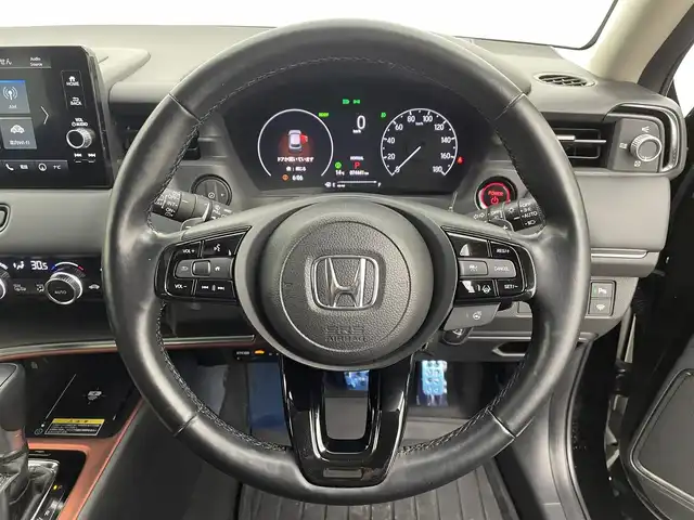 ホンダ ヴェゼル ハイブリッド e:HEV Z 宮城県 2021(令3)年 7.5万km クリスタルブラックパール 4WD/純正ナビ/（フルセグ/Bluetooth/AM/FM/HDMI）/バックカメラ/スペアキー×1/前後ドライブレコーダー/ETC2.0/デジタルインナーミラー/置くだけ充電/パドルシフト/レーダークルーズコントロール/レーンキープアシスト/衝突被害軽減システム/横滑り防止装置/クリアランスソナー/ブラインドスポットモニター/ステアリングヒーター/カーテンエアバッグ/パワーバックドア/ハーフレザー/前席シートヒーター/純正18インチAW/純正LEDヘッドライト/純正フロアマット/保証書