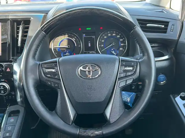 トヨタ アルファードハイブリット SR Cパッケージ 宮城県 2022(令4)年 2.5万km ホワイトパールクリスタルシャイン ツインムーンルーフ/デジタルインナーミラー/ブラインドスポットモニター/パーキングサポートブレーキ（後方接近車両）/応急用タイヤ/＝＝＝/セーフティセンス/・プリクラッシュセーフティ/・レーントレーシングアシスト/・ロードサインアシスト/・アダプティブハイビームシステム/・レーダークルーズコントロール（全車速追従機能付）/パーキングサポートブレーキ（前後方静止物）/純正フリップダウンモニター/9インチディスプレイオーディオ/・ナビ機能/・CD/DVDデッキ/・フルセグTV/・Bluetooth/・AppleCarPlay/AndroidAuto/ビルトインETC2.0/AC100V/1500Wコンセント/パワーバックドア/両側パワースライドドア/ステアリングヒーター/合皮シート/シートヒーター/ベンチレーション/パワーシート/電動パーキングブレーキ/ブレーキホールド/3眼LEDヘッドライト/フォグランプ/オートライト/スマートキー＆プッシュスタート/純正17インチAW/純正フロアマット/ドアバイザー/W/サイド/カーテンエアバッグ
