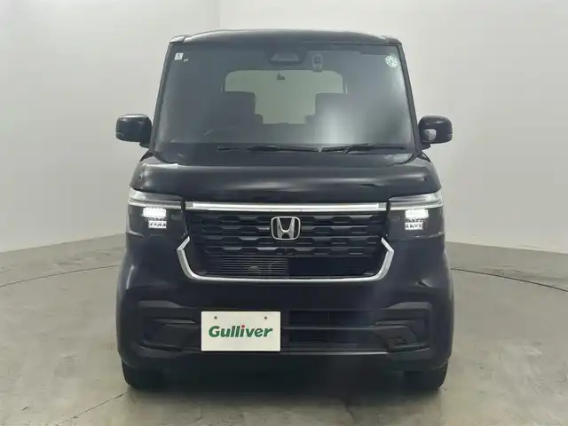 ホンダ Ｎ ＢＯＸ カスタム 岡山県 2024(令6)年 0.7万km クリスタルブラックパール 純正９インチメモリーナビ/（Ｂｌｕｅｔｏｏｔｈ/フルセグ/HDMI/USB/Carplay/Android Auto)/衝突軽減ブレーキシステム　/両側パワースライドドア/レーダークルーズコントロール/踏み間違い防止/純正ドライブレコーダー（前後）/シートヒーター(D/N)/オートハイビーム/オートライト/ＬＥＤヘッドライト/バックカメラ/コーナーセンサー（前後）/オートブレーキホールド/シートカバー（黒）/ISOFIX/後席サンシェイド/ステアリングスイッチ/チルトステアリング/シートリフター/シートバックテーブル/ウインカーミラー/ドアバイザー/チップアップシート/プッシュスタート/スマートキー/新車保証書/取扱説明書