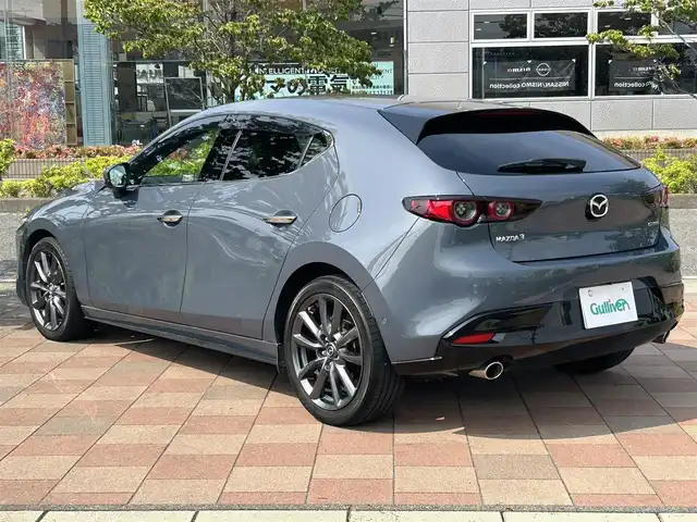 マツダ マツダ３ファストバック XD バーガンディセレクション 福島県 2019(令1)年 2.5万km ポリメタルグレーM メーカーナビ/(CD/DVD/BT/HDMI/AM/FM)/赤レザーシート/衝突軽減ブレーキ/レーンキープ/ブラインドスポットモニター/ヘッドアップディスプレイ/レーダークルーズコントロール/全方位カメラ/LEDオートライト/運転席メモリーシート/前席シートヒーター/ハンドルヒーター/前後ドライブレコーダー/パドルシフト/ETC/プッシュスタート/コーナーセンサー/アイドリングストップ/ステアリングスイッチ/純正フロアマット/ドアバイザー