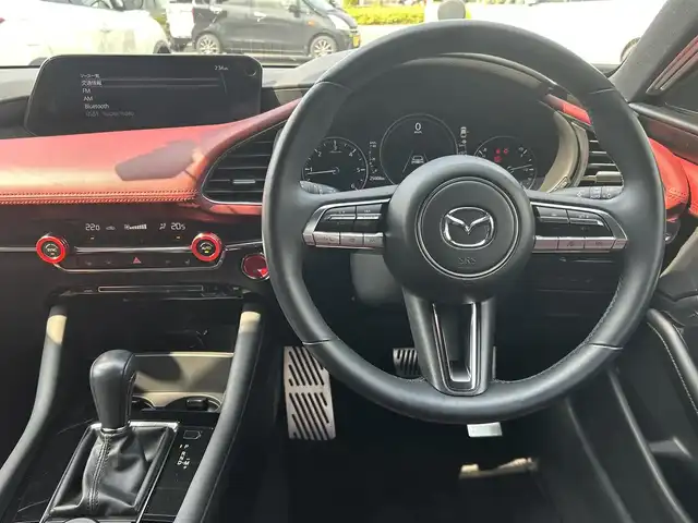 マツダ マツダ３ファストバック XD バーガンディセレクション 福島県 2019(令1)年 2.5万km ポリメタルグレーM メーカーナビ/(CD/DVD/BT/HDMI/AM/FM)/赤レザーシート/衝突軽減ブレーキ/レーンキープ/ブラインドスポットモニター/ヘッドアップディスプレイ/レーダークルーズコントロール/全方位カメラ/LEDオートライト/運転席メモリーシート/前席シートヒーター/ハンドルヒーター/前後ドライブレコーダー/パドルシフト/ETC/プッシュスタート/コーナーセンサー/アイドリングストップ/ステアリングスイッチ/純正フロアマット/ドアバイザー