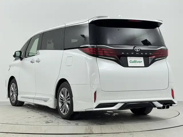 トヨタ アルファード Z 熊本県 2023(令5)年 2.7万km プラチナホワイトパールマイカ ワンオーナー/モデリスタエアロ/・フロントスポイラー/・サイドスカート/・リヤスタイリングキット/(リヤスカート+ドレスアップマフラー)/・フロントグリル/・シグネチャーイルミブレード/左右独立ムーンルーフ/パノラミックビューモニター/14インチHDディスプレイディスプレイオーディオ/・ナビ機能有り、USB入力、HDMI入力端子/・フルセグTV、BT対応、AM/FM/・AppleCarPlay、AndroidAuto、Miracast/TVキット/ステアリングスイッチ/後席ディスプレイ/両側電動スライドドア/デジタルインナーミラー /ビルトインETC2.0/社外ドライブレコーダー（前後）/パワーバックドア/横滑り防止装置/電動格納ミラー/オートライト/LEDヘッドライト/LEDフォグ/純正18インチアルミホイール/保証書、取説、スペアキー、リモコン有り
