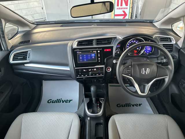 ホンダ フィット 15X 神奈川県 2014(平26)年 3.2万km プレミアムホワイトパール ワンオーナー/純正ナビ（CD/AM/FM/USB/HDMI/BT/ワンセグTV)/バックカメラ/ビルトインETC/ステアリングスイッチ/横滑り防止装置/盗難防止装置/ABS/アイドリングストップ/プッシュスタート/オートライト/電格ウィンカーミラー/フロントワイパーデアイサー/純正フロアマット/純正アルミホイール/純正ドアバイザー/ISOFIX/スペアキー×１/保証書/取扱説明書