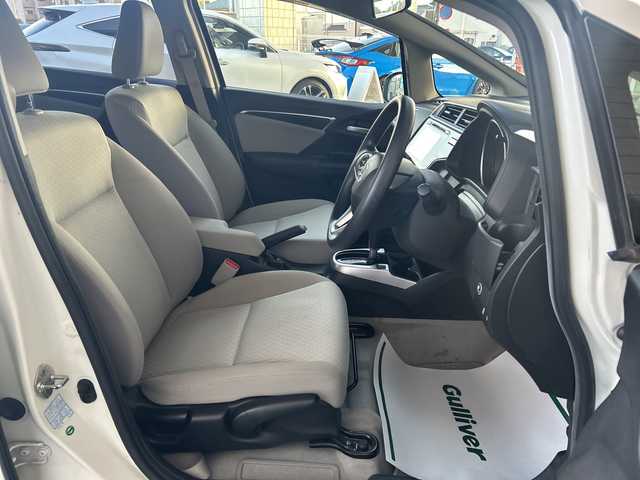 ホンダ フィット 15X 神奈川県 2014(平26)年 3.2万km プレミアムホワイトパール ワンオーナー/純正ナビ（CD/AM/FM/USB/HDMI/BT/ワンセグTV)/バックカメラ/ビルトインETC/ステアリングスイッチ/横滑り防止装置/盗難防止装置/ABS/アイドリングストップ/プッシュスタート/オートライト/電格ウィンカーミラー/フロントワイパーデアイサー/純正フロアマット/純正アルミホイール/純正ドアバイザー/ISOFIX/スペアキー×１/保証書/取扱説明書