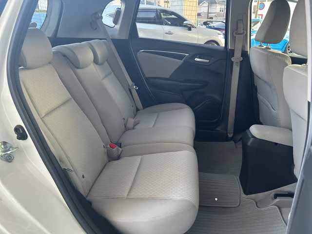 ホンダ フィット 15X 神奈川県 2014(平26)年 3.2万km プレミアムホワイトパール ワンオーナー/純正ナビ（CD/AM/FM/USB/HDMI/BT/ワンセグTV)/バックカメラ/ビルトインETC/ステアリングスイッチ/横滑り防止装置/盗難防止装置/ABS/アイドリングストップ/プッシュスタート/オートライト/電格ウィンカーミラー/フロントワイパーデアイサー/純正フロアマット/純正アルミホイール/純正ドアバイザー/ISOFIX/スペアキー×１/保証書/取扱説明書