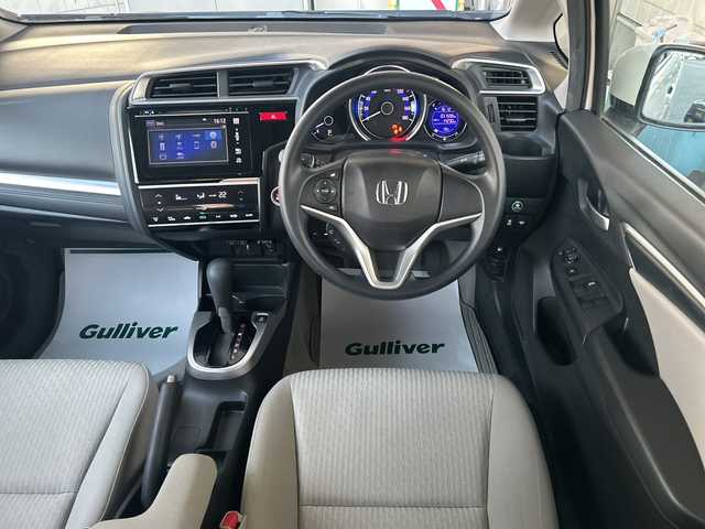 ホンダ フィット 15X 神奈川県 2014(平26)年 3.2万km プレミアムホワイトパール ワンオーナー/純正ナビ（CD/AM/FM/USB/HDMI/BT/ワンセグTV)/バックカメラ/ビルトインETC/ステアリングスイッチ/横滑り防止装置/盗難防止装置/ABS/アイドリングストップ/プッシュスタート/オートライト/電格ウィンカーミラー/フロントワイパーデアイサー/純正フロアマット/純正アルミホイール/純正ドアバイザー/ISOFIX/スペアキー×１/保証書/取扱説明書