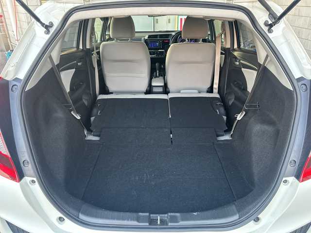 ホンダ フィット 15X 神奈川県 2014(平26)年 3.2万km プレミアムホワイトパール ワンオーナー/純正ナビ（CD/AM/FM/USB/HDMI/BT/ワンセグTV)/バックカメラ/ビルトインETC/ステアリングスイッチ/横滑り防止装置/盗難防止装置/ABS/アイドリングストップ/プッシュスタート/オートライト/電格ウィンカーミラー/フロントワイパーデアイサー/純正フロアマット/純正アルミホイール/純正ドアバイザー/ISOFIX/スペアキー×１/保証書/取扱説明書