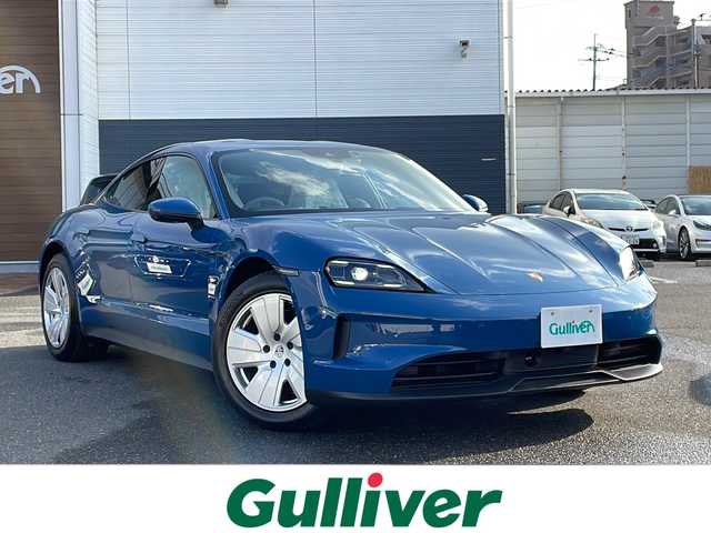 ポルシェ ポルシェ タイカン 佐賀県 2025(令7)年 0.1千km 青 ワンオーナー/ネプチューンブルー/4+1シート/スポーツクロノパッケージ/シートベンチレーション/サラウンドビューモニター/スムースフィニッシュレザーインテリア/プライバシーガラス/純正19インチアルミホイール/保証書/取扱説明書/記録簿/スマートキー/スペアキー有/クルーズコントロール/Bluetooth接続/後席用モニター/ETC2.0/全方位カメラ/AppleCarPlay/AndroidAuto/電動リアゲート/前後ドライブレコーダー/純正フロアマット/前席パワーシート/前席シートヒーター/前席エアシート/ABS/前後コーナーセンサー/レーンキープアシスト/盗難防止装置/オートライト/オートマチックハイビーム/LEDライト/衝突被害軽減システム/革巻ステアリング/ステアリングスイッチ/レーンチェンジアシスト/プロアクティブ乗員保護/シートメモリ/ブラインドスポットモニター/車間距離警告/車線逸脱警告/疲労検知システム