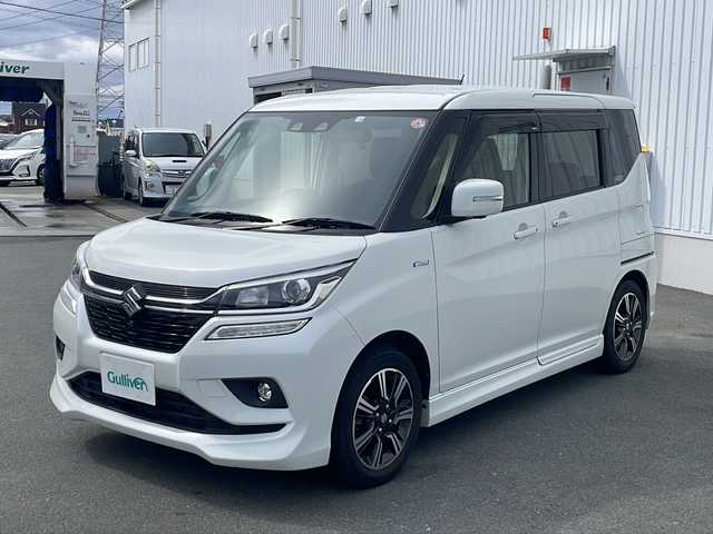 スズキ ソリオ バンディット HV MV 三重県 2020(令2)年 1.6万km ピュアホワイトP 純正ナビ　(CN-RZ865)/全方位カメラ/両側パワースライドドア/前後車内ドラレコ/デュアルセンサーブレーキ/パドルシフト/クルーズコントロール/純正フロアマット/純正15インチアルミ/Bluetooth/ワンセグTV/運転席シートヒーター/ドアバイザー/HIDヘッドライト/フォグランプ