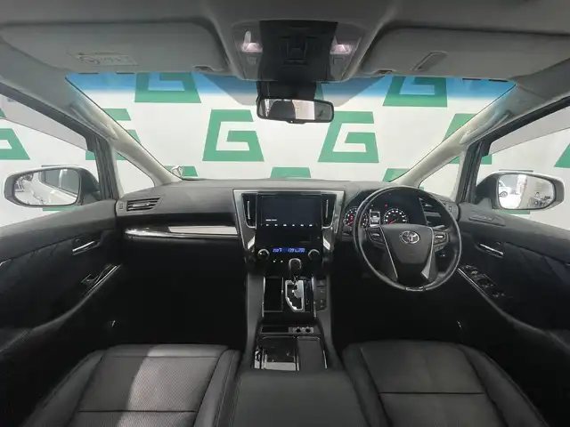 トヨタ アルファード S Cパッケージ 鹿児島県 2019(令1)年 1.9万km ホワイトパールクリスタルシャイン 禁煙車　/ツインムーンルーフ　/純正フリップダウンモニター　/純正９インチナビ　/トヨタセーフティセンス/前後コーナーセンサー/バックカメラ　/全席パワーシート　/両側パワースライドドア/前席シートヒーター/前席シートベンチレーション/ウッド調コンビハンドル　/LEDヘッドライト/ETC/純正アルミホイール/オートライト/オートマチックハイビーム