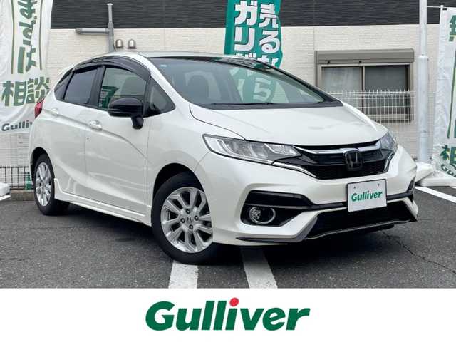 ホンダ フィット 13G S ホンダセンシング 三重県 2017(平29)年 4.6万km プレミアムホワイトパールⅡ 登録時45275km/ワンオーナー/禁煙車/純正ナビ/（AM/FM/TV/Bluetooth）/フルセグTV/バックカメラ/ETC/ステアリングスイッチ/パドルシフト/クルーズコントロール/ホンダセンシング/衝突軽減システム/レーンキープアシスト/プッシュスタート/純正フロアマット/純正アルミ/スペアキー