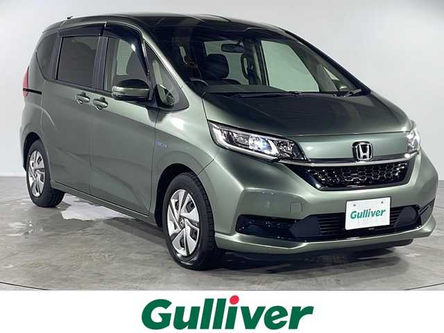 ホンダ フリード ハイブリット G ホンダセンシング 福岡県 2021(令3)年 3.8万km シルバーミストグリーンM 純正メモリナビ/・CD/DVD/BT/フルセグTV/・バックモニター/ホンダセンシング/両側パワースライドドア/ETC/シートヒーター(D/N)/ステアリングリモコン/LEDヘッドライト/スマートキー/・プッシュスタート/・スペアキー/社外フロアマット/ドアバイザー