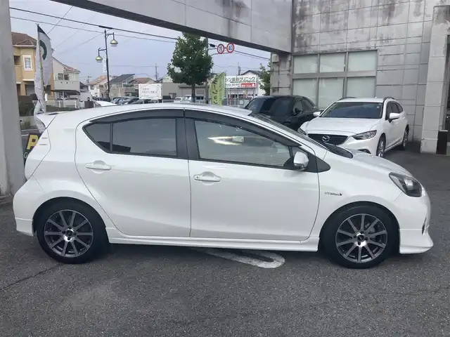 トヨタ アクア S 愛知県 2013(平25)年 5.8万km ライムホワイトパールクリスタルシャイン MODELLISTAエアロVer1/リヤコンビガーニッシュ/リヤスポイラー/TRD16インチアルミ/ダウンサス/純正SDナビTV/Bluetoothオーディオ/バックカメラ/スマートキー×2ケ/プッシュスタート/ETC/前後2カメラドライブレコーダー/LEDヘッドライト/オートライト/純正フォグ