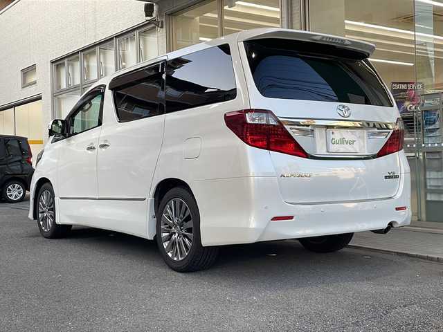 トヨタ アルファード 350S タイプゴールドⅡ 高知県 2014(平26)年 3.9万km ホワイトパールクリスタルシャイン 社外ナビ/(Bluetooth/CD/SD/DVD/USB/フルセグ)/フリップダウンモニター/システムコンソールBOX/(ヒーター/クーラー)/サンルーフ/ビルトインETC/バックカメラ/サイドカメラ/クルーズコントロール/両側パワースライドドア/パワーバックドア/純正18インチアルミホイール/オートライト/LEDヘッドライト/フォグランプ/アダプティブフロントライティングシステム/プッシュスタート/スマートキー/100V充電/MTモード付AT/オットマン/3列シート/横滑り防止装置/盗難防止装置/衝突被害軽減ブレーキ/オートリトラクタブルミラー/純正フロアマット/ドアバイザー