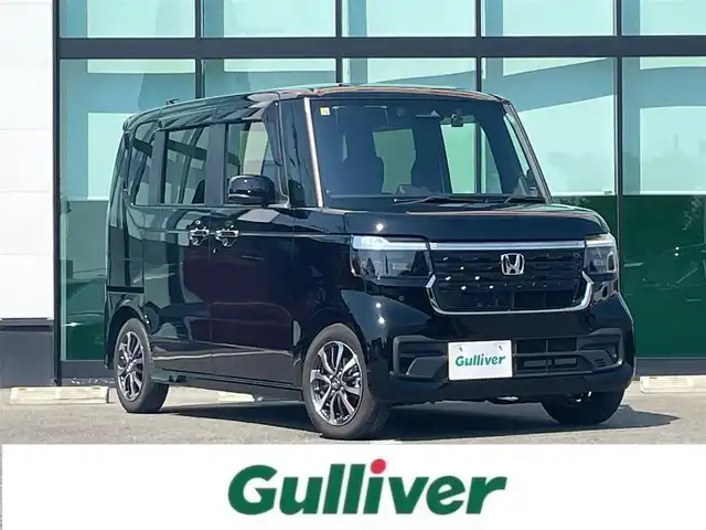 ホンダ Ｎ ＢＯＸ カスタム 和歌山県 2023(令5)年 1.3万km クリスタルブラックパール 純正8インチナビ/バックカメラ/フルセグTV/衝突軽減ブレーキ/レーンキープアシスト/前後コーナーセンサー/オートライト/レーダークルーズコントロール/ビルトインETC/前席シートヒーター/前方ドラレコ/片側パワスラ/純正フロアマット/純正14インチアルミ/ステアリングリモコン/ドアバイザー/ブレーキホールド/プッシュスタート/後席ロール式サンシェード