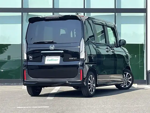 ホンダ Ｎ ＢＯＸ カスタム 和歌山県 2023(令5)年 1.3万km クリスタルブラックパール 純正8インチナビ/バックカメラ/フルセグTV/衝突軽減ブレーキ/レーンキープアシスト/前後コーナーセンサー/オートライト/レーダークルーズコントロール/ビルトインETC/前席シートヒーター/前方ドラレコ/片側パワスラ/純正フロアマット/純正14インチアルミ/ステアリングリモコン/ドアバイザー/ブレーキホールド/プッシュスタート/後席ロール式サンシェード
