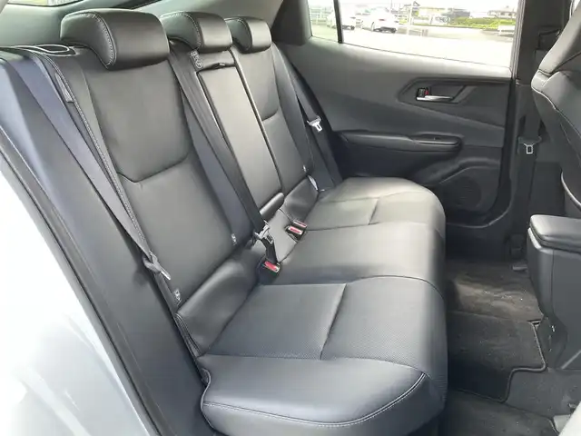 トヨタ プリウス Z 熊本県 2024(令6)年 2.2万km プラチナホワイトパールマイカ ワンオーナー/モデリスタエアロ/純正12.3インチディスプレイ(TV・ナビ機能付)/・AM/FM/USB/Bluetooth/パノラミックビューモニター/ビルトインETC2.0/アドバンストパーク/TVキャンセラー/パワーバックドア/電子パーキングブレーキ/AUTO HOLD機能/100V電源/置くだけ充電/DN席シートヒーター/シートベンチレーション/ISOFIX対応/革巻きステアリング/ステアリングヒーター/ステアリングリモコン/純正19インチアルミホイール/純正LEDヘッドライト/・オートマチックハイビーム/純正フロアマット/純正ドアバイザー/新車保証書/スペアキー１本/トヨタセーフティセンス/・レーダークルーズコントロール/・レーンディパーチャーアラート/・ブラインドスポットモニター/・プリクラッシュセーフティ/・クリアランスソナー/・プロアクティブドライビングアシスト/・リヤクロストラフィックアラート/・後方車両接近告知/・リヤカメラディテクション/・パーキングサポートブレーキ/・安心降車アシスト/・周辺車両接近時サポート/・ロードサインアシスト