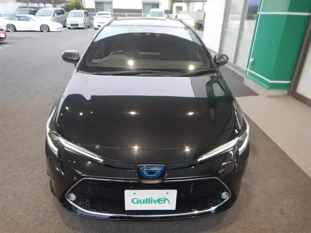 トヨタ カローラツーリング ハイブリッド ダブルバイビー 静岡県 2020(令2)年 2.4万km ブラックマイカ ワンオーナー/新車保証書/取扱説明書/PCS（プリクラッシュセーフティー）/LTA(レーントレーシングアシスト)/BSM(ブラインドスポットモニター)/RCTA(リヤクロストラフィックアラート)/PKSB(パーキングサポートブレーキ)/RSA( ロードサインアシスト)/追従クルーズコントロール/前後クリアランスソナー/オートライト/オートハイビーム/ステアリングヒーター/前席シートヒーター/ハーフレザーシート/本革ステアリング/純正ナビゲーション/・FM/・AM/・USB/・Miracast/・Bluetooth接続/・地デジフルセグ/ビルトインETC/プッシュスタート/スマートキー×2/純正フロアマット/純正ドアバイザー/純正17インチアルミ