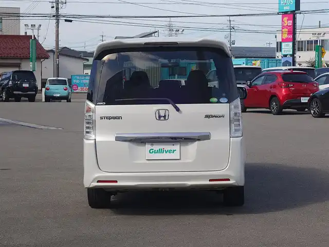 ホンダ ステップワゴン スパーダ パワーエディション 山形県 2013(平25)年 13.6万km ホワイトオーキッドパール 4WD/ワンオーナー/純正フリップダウン/純正メモリナビ/　　【CD DVD フルセグ USB】/バックカメラ/両側パワースライドドア/HIDオートヘッドライト/純正16インチアルミホイール/アイドリングストップ/ステアリングスイッチ/パドルシフト/電動格納ウィンカーミラー/純正フロアマット/ドアバイザ―/スマートキー/ETC