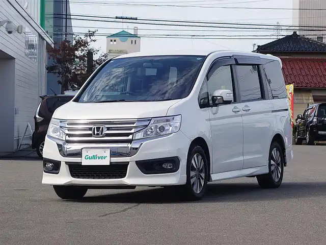 ホンダ ステップワゴン スパーダ パワーエディション 山形県 2013(平25)年 13.6万km ホワイトオーキッドパール 4WD/ワンオーナー/純正フリップダウン/純正メモリナビ/　　【CD DVD フルセグ USB】/バックカメラ/両側パワースライドドア/HIDオートヘッドライト/純正16インチアルミホイール/アイドリングストップ/ステアリングスイッチ/パドルシフト/電動格納ウィンカーミラー/純正フロアマット/ドアバイザ―/スマートキー/ETC