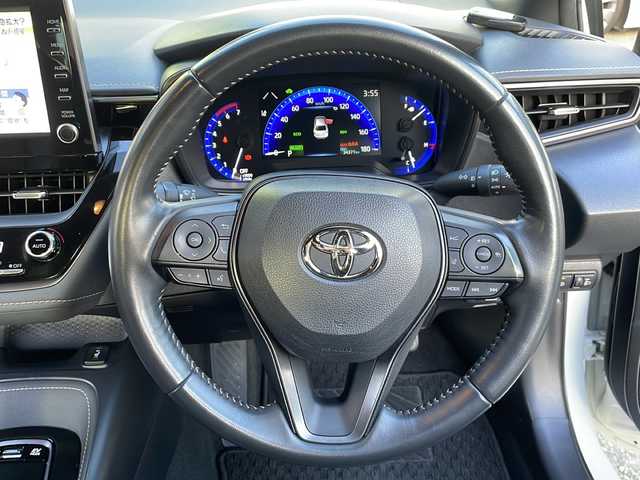 トヨタ カローラ ハイブリット ダブルバイビー 大阪府 2021(令3)年 3.5万km ホワイトパールクリスタルシャイン ワンオーナー/純正メモリナビ/・AM/FM/Bluetooth/・フルセグテレビ/モデリスタエアロ/バックカメラ/ビルトインETC/前後ドライブレコーダー/レーダークルーズコントロール/衝突軽減ブレーキ/レーンキープアシスト/ブラインドスポットモニター/横滑り防止装置/盗難防止装置/電動パーキングブレーキ/前後コーナーセンサー/シートヒーター（D席+N席）/LEDヘッドライト/オートマチックハイビーム/オートライト/オートエアコン/プッシュスタートボタン/スマートキー×2/ステアリングリモコン/革巻きステアリング/純正17インチアルミホイール/12V充電器/USBジャック/純正フロアマット/保証書/取扱説明書