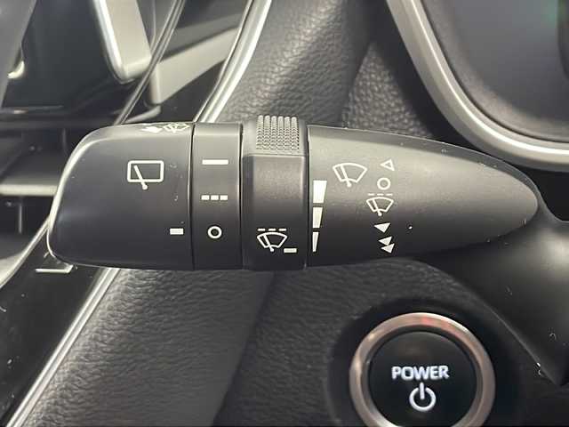 トヨタ カローラ スポーツ ハイブリッドG Z 愛知県 2022(令4)年 2.1万km プラチナホワイトパールマイカ 純正ナビ/バックカメラ/レーダークルーズコントロール(全車速追従機能・停止保持機能付き)/フルセグTV/Bluetooth・USB・AM・FM・AppleCarPlay/ビルトインETC/純正18インチアルミホイール/ファブリックシート/前席シートヒーター/革巻きステアリング/純正フロアマット/トヨタセーフティセンス/プリクラッシュセーフティ/レーダークルーズコントロール(全車速追従機能・停止保持機能付き)/レーントレーシングアシスト/レーンディパーチャーアラート/プロアクティブドライビングアシスト/ロードサインアシスト/ブラインドスポットモニター(BSM)/安心降車アシスト/パーキングサポートブレーキ/先行車発進お知らせ/クリアランスソナー/フルLEDヘッドライト/オートライト/オートマチックハイビーム/電動格納ミラーウィンカー/スマートキー/プッシュスタート/イモビライザー/スペアキー１本/取扱説明書/マルチメディア説明書